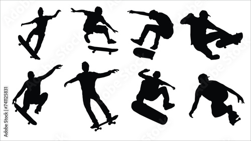 Skateboarders. Male silhouette skateboarding. photo
