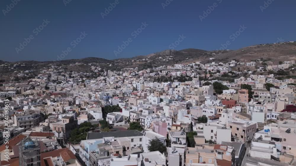 Aerial video of white houses in a small village on the island of Syros in Greece Aerial video of white houses in a small village on the island of Syros in Greece