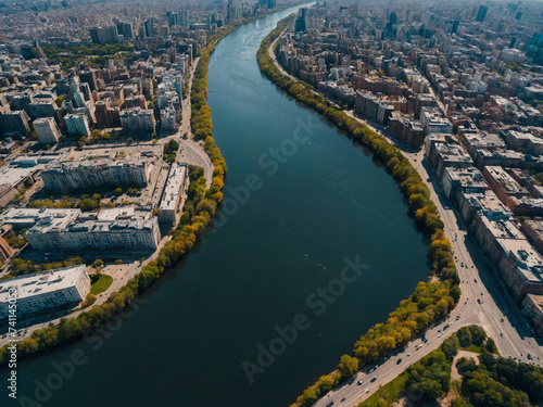 Aerial view of the river that extends in the middle of the city