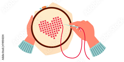 Cross heart hand embroidery. Female hands holding embroidery hoop with heart embroidery. Cartoon vector illustration of hands sewing red heart decoration on cloth isolated on white background.