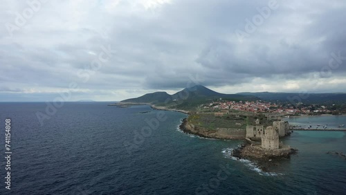 The Mediterranean Sea and Methoni Castle in Modon in Europe, Greece, Peloponnese, Mani, in summer, on a sunny day. photo