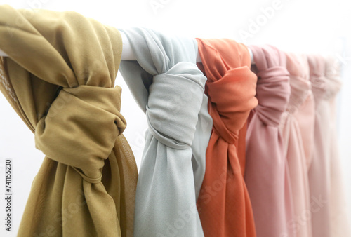 Muslim women wearing pashmina hijab, showing details of the hijab worn. photo