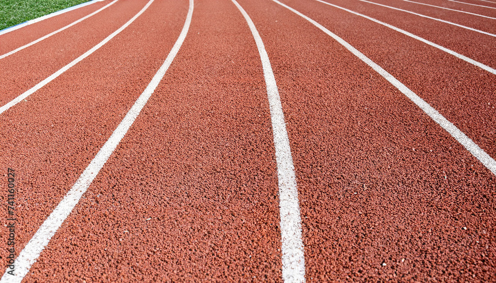Athletics all weather running track texture, white; sport background, copy space Athletics all weather running track texture, white; sport background, copy space
