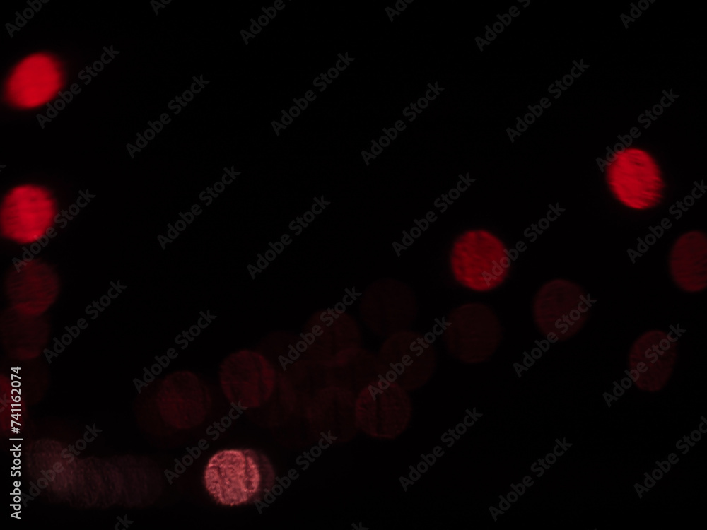 Blurred bokeh lights from cars on the road at night for abstract traffic background. Blurred bokeh lights from cars on the road at night for abstract traffic background.