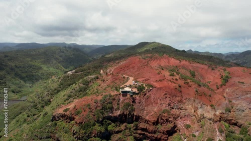 Drone Spin Showcasing Mirador de Abrante and Red Rocks Amidst Green Mountains in La Gomera Island, Spain photo
