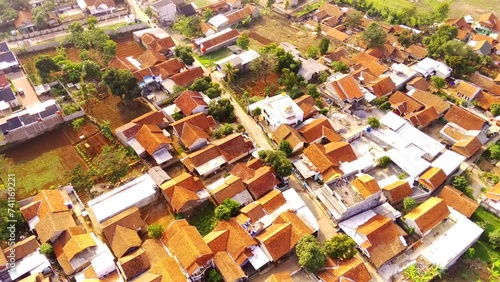Aerial Photography. Hyper Lapse Landscape view of a settlement on the edge of the city. Residential district in the city of Cicalengka - Bandung, Indonesia. Shot from a drone flying 200 meters high photo