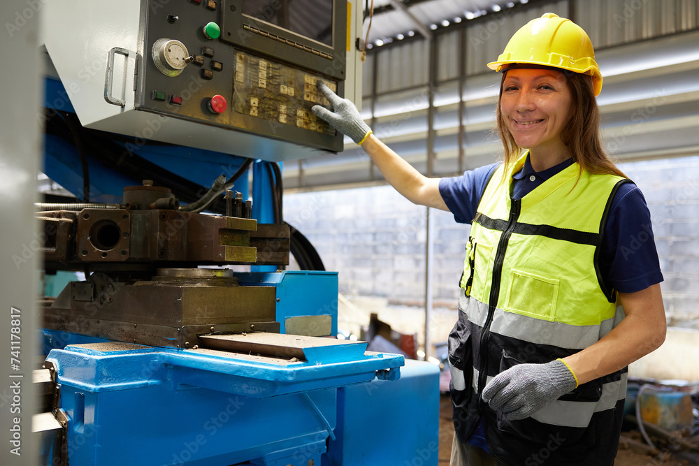 technician or engineer working and checking lathe machine in the factory technician or engineer working and checking lathe machine in the factory