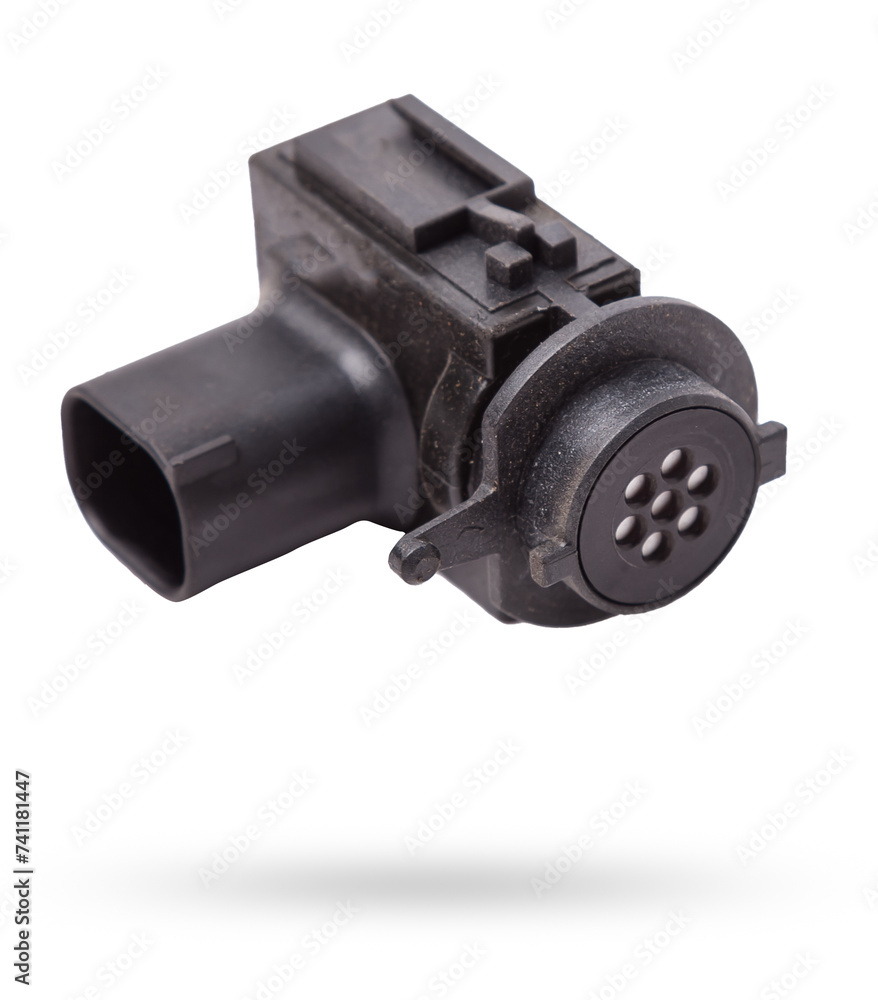 Close-up of a spare part for an air quality sensor car for replacement during repair or for sale at an auto-parsing. Close-up of a spare part for an air quality sensor car for replacement during repair or for sale at an auto-parsing.
