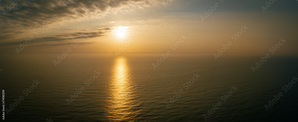Aerial view of beautiful sea wave and sunrise sky