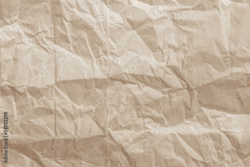 Old paper vintage texture surface for background. Recycle pale brown paper crumpled texture, Cream color recycled kraft paper texture blank with copy space for text.