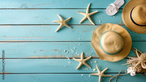Hat, sunglasses and seashells on blue wooden background, flat lay - top view