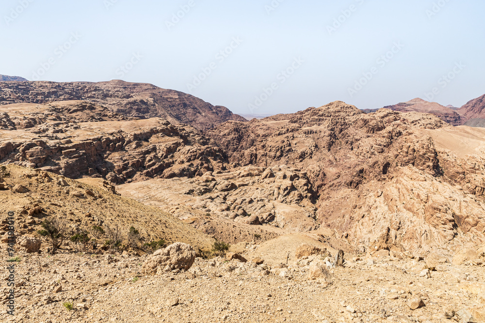 Panoramic view of low mountains in gorge Wadi Al Ghuwayr or An Nakhil and wadi Al Dathneh from the road leading to it near Amman in Jordan