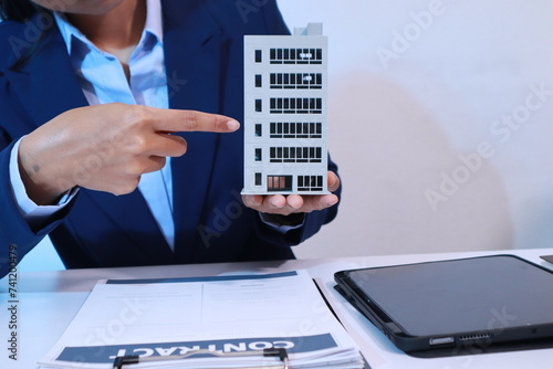 Foto business and real estate, including apartments, desks, and contracts