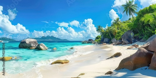 Idyllic tropical beach with white sand, clear turquoise water, granite boulders, and lush palm trees under a blue sky.