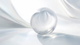 白い布の上に置かれた透明の球体