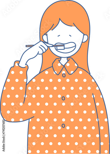 歯ブラシをする女性