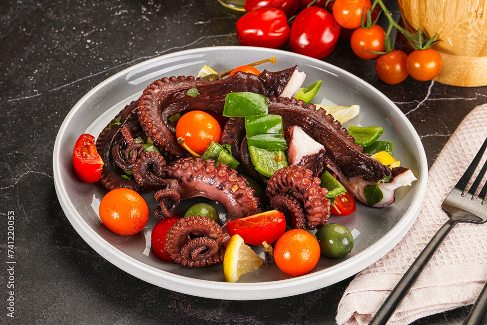Salad with octopus tentacle and vegetables