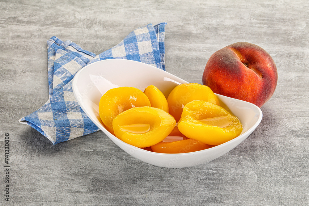 Ripe sweet and juicy canned peach Ripe sweet and juicy canned peach