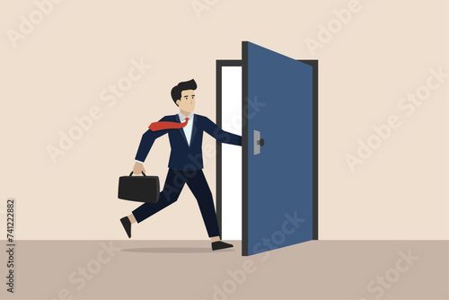 Open the door to find new opportunity, hope to find success, way to exit, escape to bright future concept, businessman open the door to see bright light coming in.