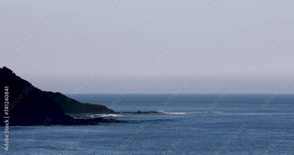 Motion of waves crashing against rocky cliffs in the sea. Motion of waves crashing against rocky cliffs in the sea.