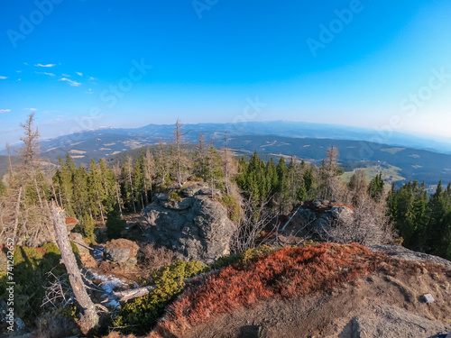 Scenic view of massive rock formation called Grossofen surrounded by idyllic forest in Modriach, Hebalm, Kor Alps, border Carinthia Styria, Austria. Refreshing hiking trail in remote Austrian Prealps photo