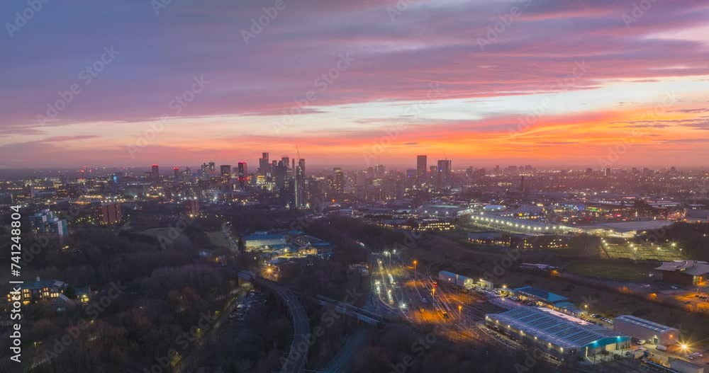 Aerial hyper lapse video of Manchester skyline at dusk