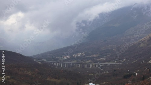 Cocullo, Italy A view of the E80 elevated highway through a valley  photo