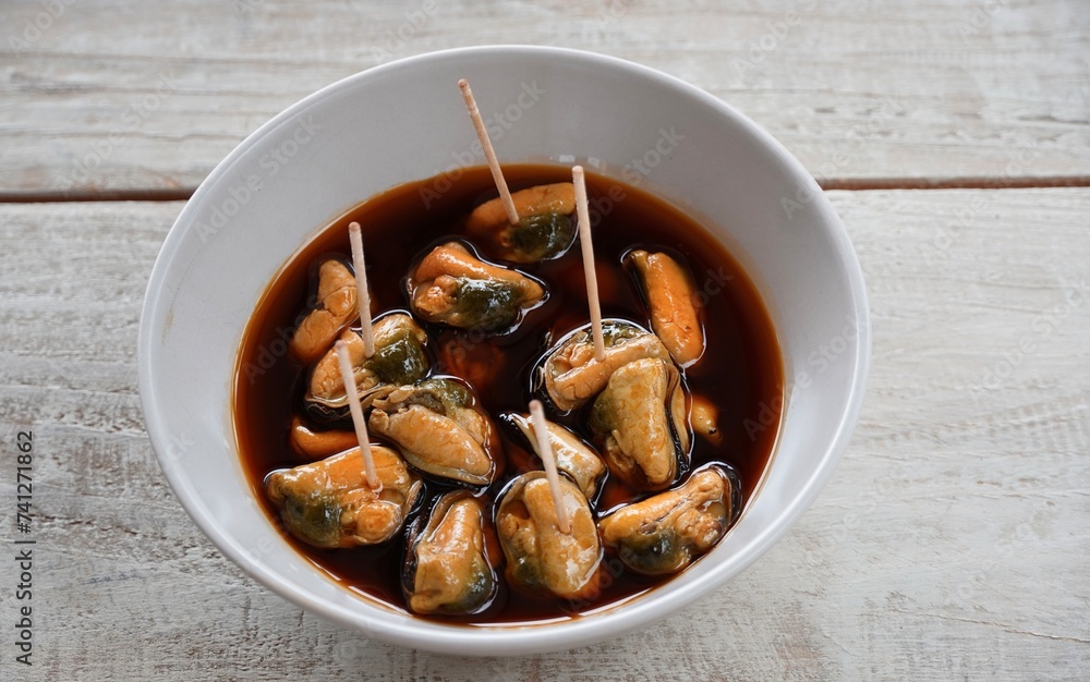 Marinated mussels in a vol, marinated mussels appetizer with space for text. Marinated mussels in a vol, marinated mussels appetizer with space for text.