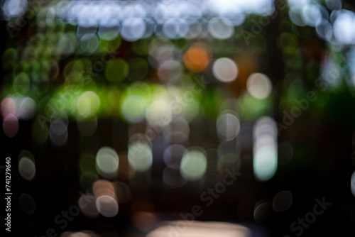 Close-up of hand holding smart phone at night,Low angle view of illuminated lights against sky during sunset,Illuminated defocused lights at night,View of illuminated woman at night.Close-up of waterd photo