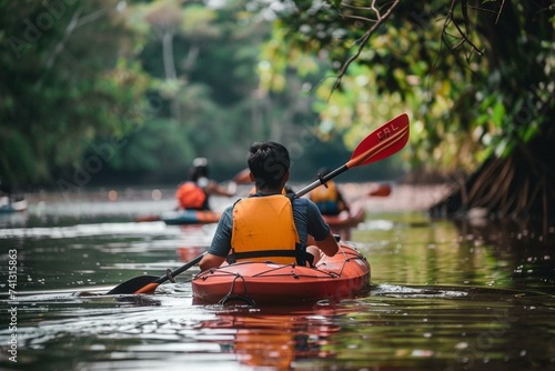Kayaking Adventure - Paddle, Flow, and Nature's Serenade in the Refreshing Waters of a Picturesque River Exploration © Karen