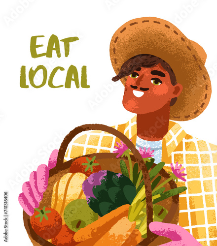 Farmer holding basket with harvest, natural organic farm vegetables. Happy ma...