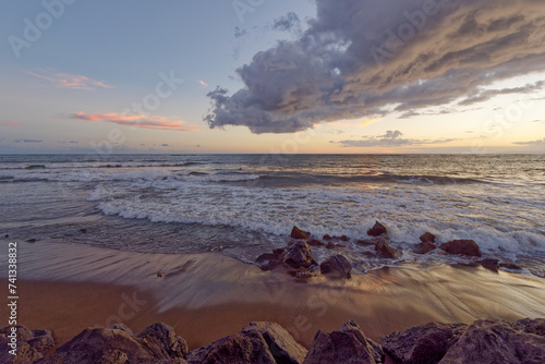 Amazing sunrise over Kekaha Beach, Island of Kauai, Hawaii photo