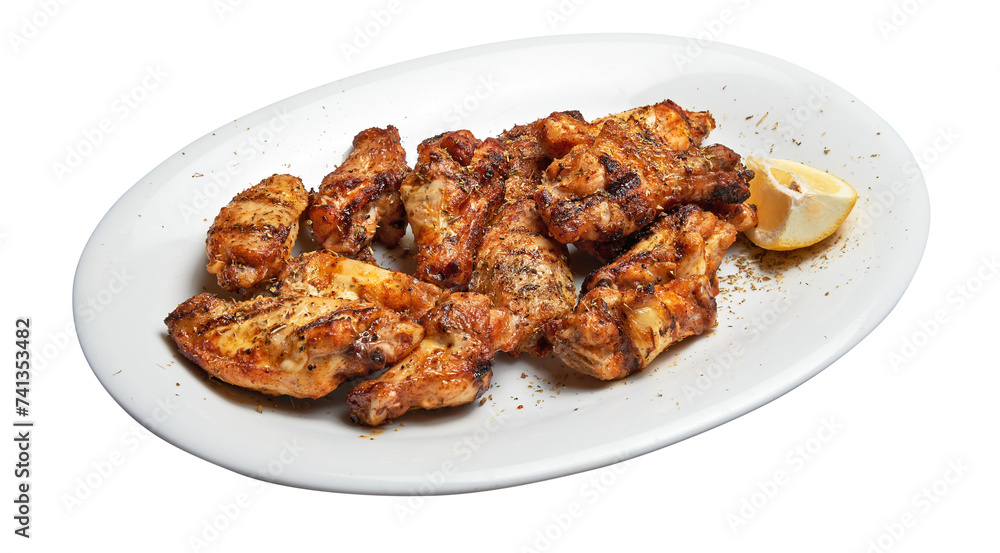 Floating White plate with roasted chicken wings Floating White plate with roasted chicken wings