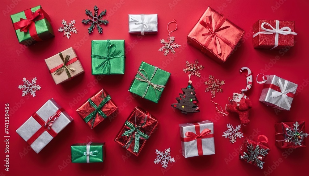 an assortment of small christmas presents on a red foil background an assortment of small christmas presents on a red foil background