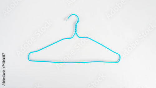 Plastic clothes hanger isolated on white background 