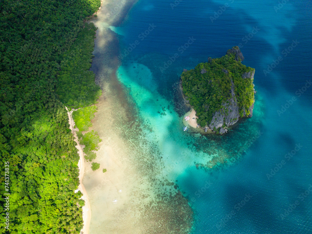 Bukal Island with small sandy beach. Cadlao Island. El Nido, Palawan. Philippines.