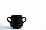 Black cauldron pot on white background