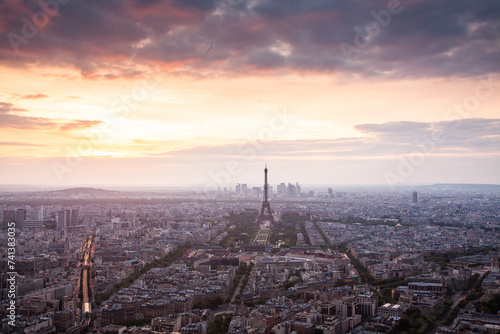 skyline of Paris with Eiffel Tower at sunset in Paris, France
