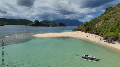 Aerial view of Mahoro Beach with traditional fishing boat, Siau, Indonesia. photo