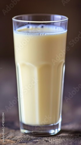 Creamy milk swirls in a glass, a symbol of nourishment and wholesomeness.