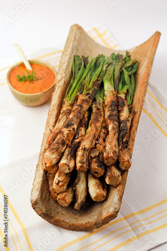 Calçots and its sauce. Typical meal from Catalonia, Spain. They are a type of green scallions.