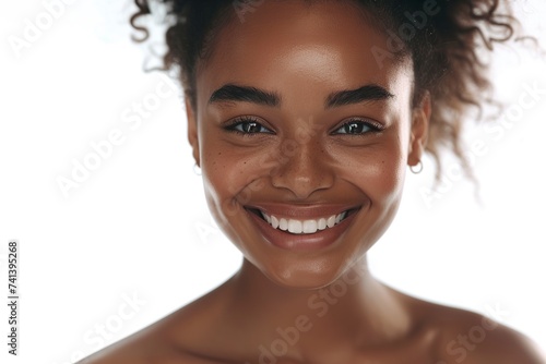 beautiful young african american posing in front of the camera photo