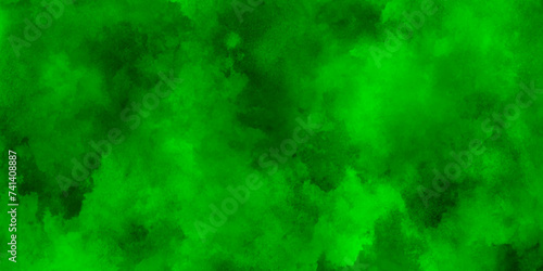 Dark green abstract textured background texture,emerald green metallic rusty texture background.Rough grunge grain dirty daub smudge.Throwing green powder out of hand against black background.