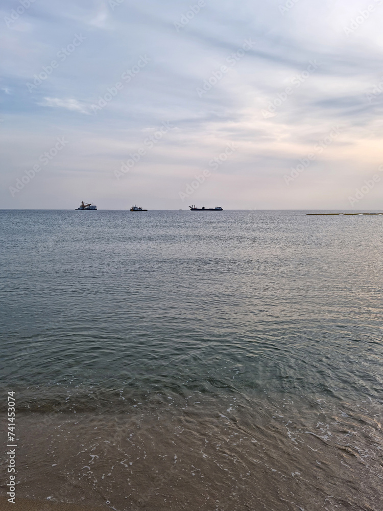 Sky and sea landscape with ships
Sky and sea landscape with ships
