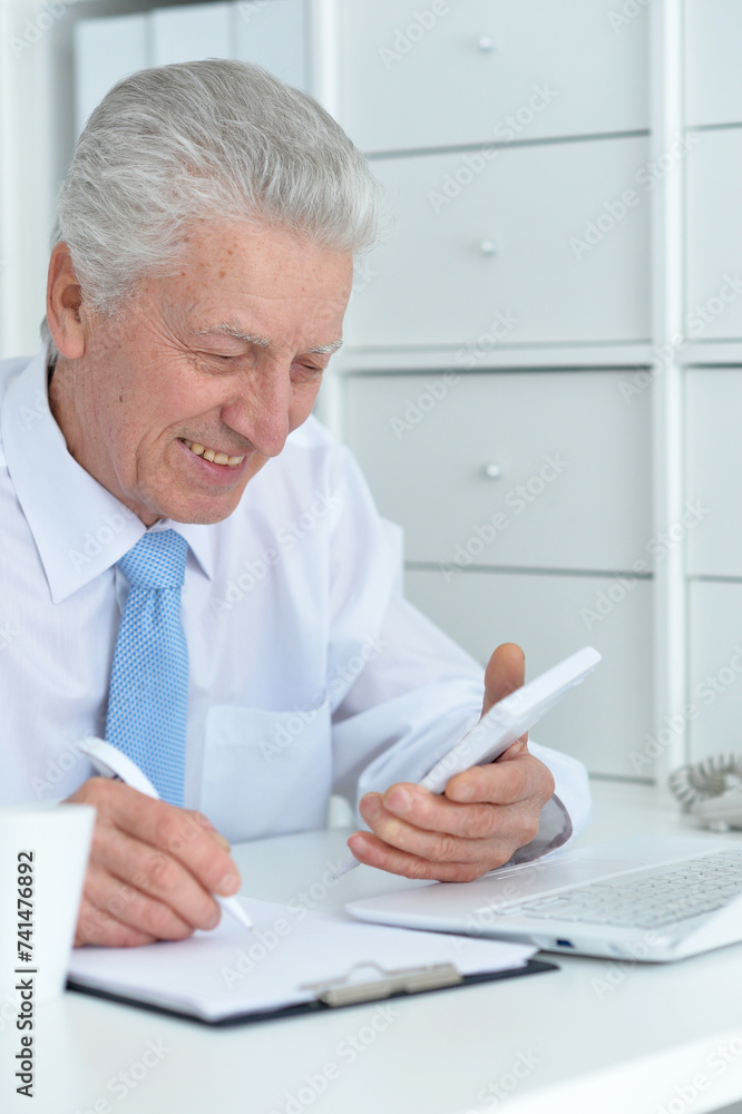Close up portrait of happy senior businessman Close up portrait of happy senior businessman
