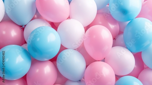 A bunch of pink, blue, and white balloons. Ideal for celebrations and events