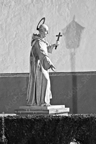 Wallpaper Mural Sculpture of a saint in front of Saint Peter parish church in Carmona Torontodigital.ca