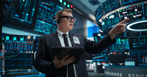 Obraz na płótnie Portrait of Professional Male Trader Working on a Stock Exchange