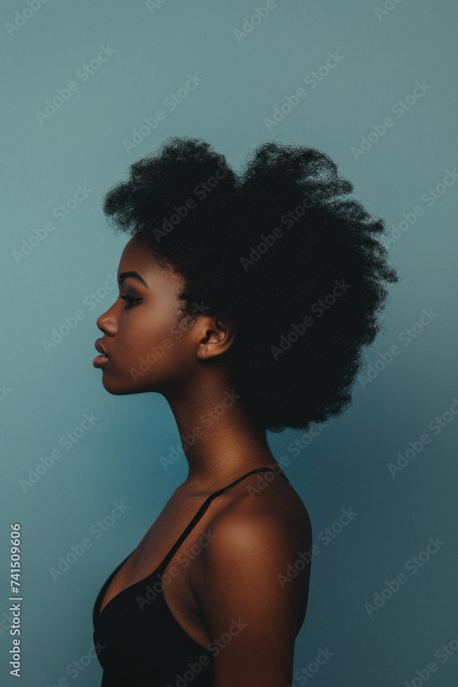Young adult African American woman posing for beauty portrait. Pretty smiling happy Black girl fashion model smiling on background, attractive ethnic girl looking at camera. Close up face . Young adult African American woman posing for beauty portrait. Pretty smiling happy Black girl fashion model smiling on background, attractive ethnic girl looking at camera. Close up face .