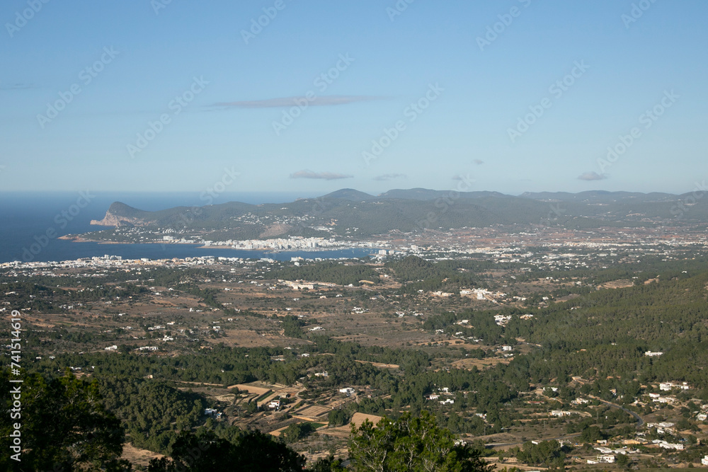 Obraz premium Views of the bay of the city of San Antonio on the west coast of Ibiza from the Sa Talaya mountain in Sant Jose.